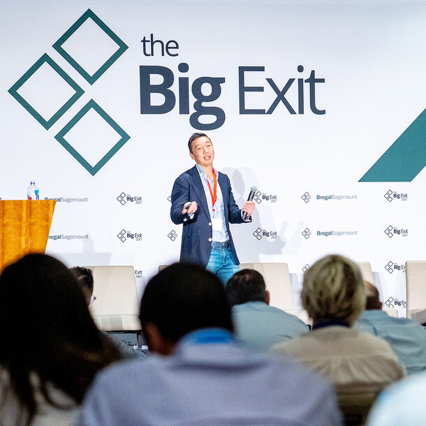 Speaker on stage | Event Photographer Miami | Corporate Conference Events